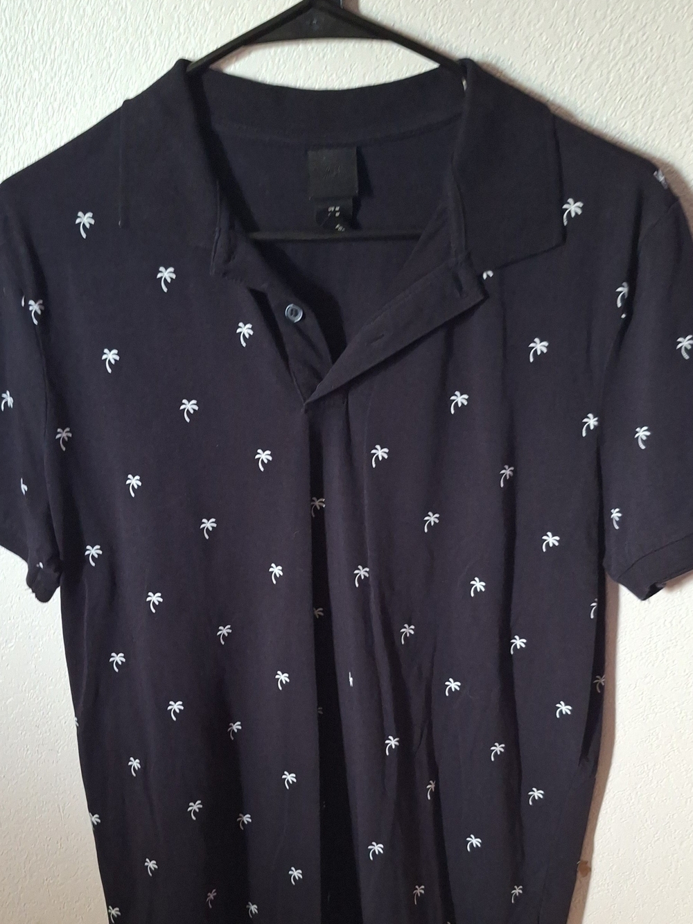 H&M Black Short-Sleeve Polo with White Palm Motif